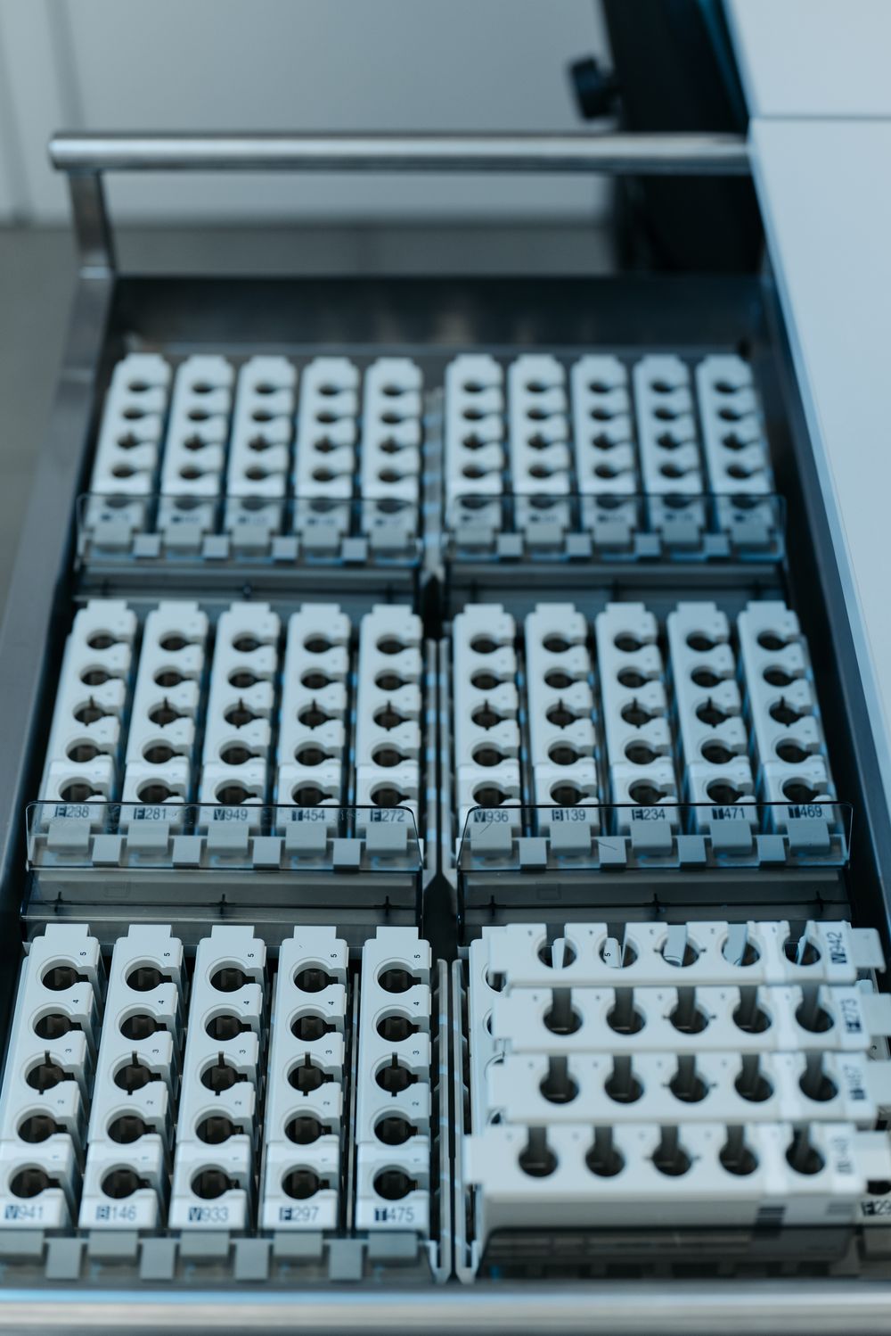Rack of sample trays inside a laboratory analyzer